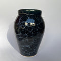 Deep blue vase with white bubbles